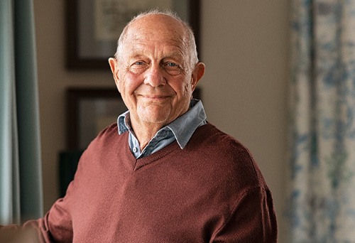 Closeup of senior man smiling at home